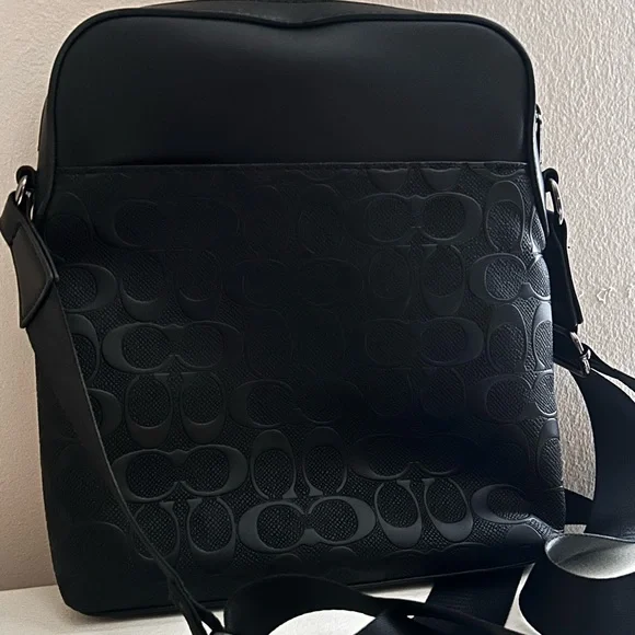 Coach BlackBag with Sleek Monogram Design